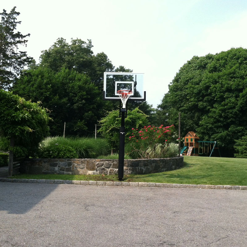 Adjustable basketball hoops